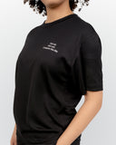 Woman wearing Conquer T-Shirt in Power Black – classic athletic fit performance t-shirt for everyday movement and training by I AM-ABLE